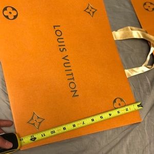 Authentic Louis Vuitton holiday shopping bag.